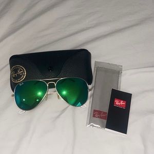 Ray-Ban Aviators green mirrored lens.